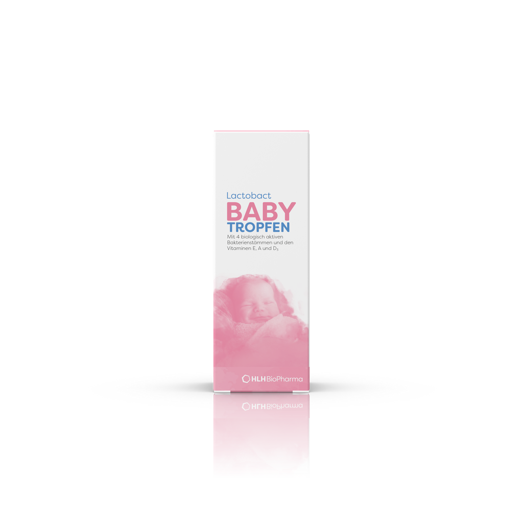 Produktbild Frontansicht von Lactobact BABY TROPFEN mit einem schlafendem Baby auf der rosafarbenen Verpackung.