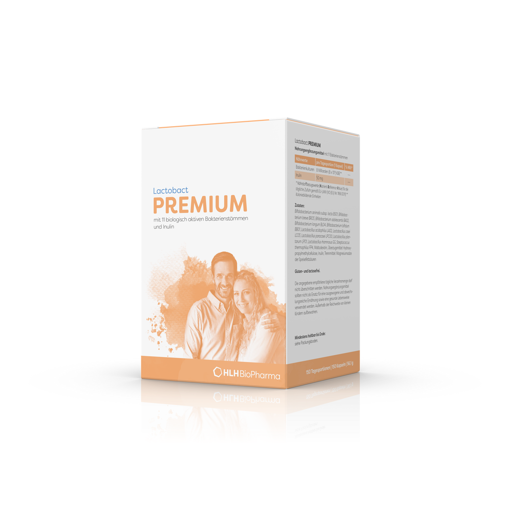 Produktbild schräge Ansicht von Lactobact PREMIUM 150 Kapseln mit glücklichem Paar und beigem Aquarell Wasserfleck auf der Verpackung. 